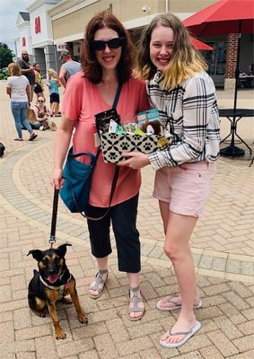 two girls and a dog named lucy at The Shoppes at Grand Prairie in Peoria, IL