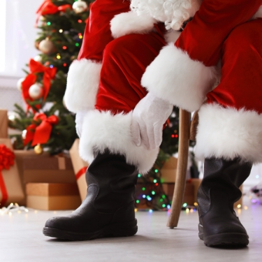 Holi-375x375 – 7 Santa putting his black boot on