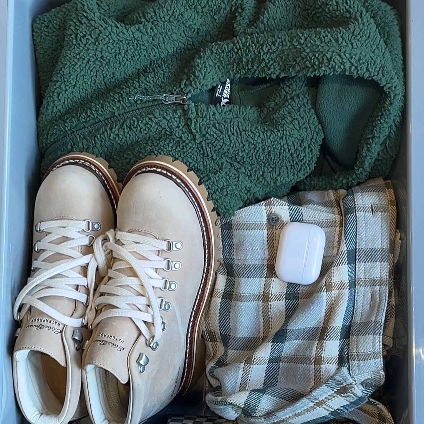 Eddie Bauer boots, green sweater, flannel